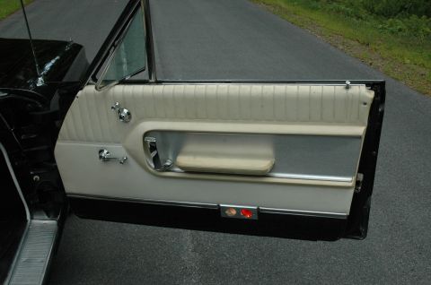 1964 Ford Galaxie - Interior view of a 1964 Ford Galaxie door panel, showing the upholstery and trim.