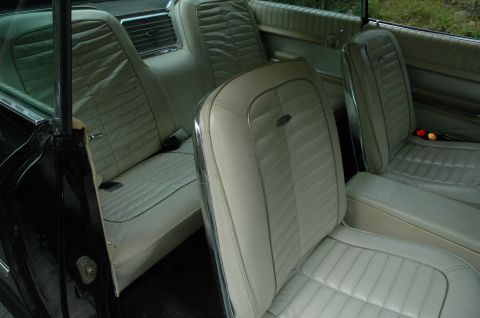 1964 Ford Galaxie - The interior of a 1964 Ford Galaxie 500XL shows off its distinctive pleated seats and chrome accents.