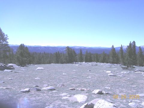 1994 Ford Bronco - Mountain landscape with trees and rocks under a clear blue sky, dated 08/29/2005.