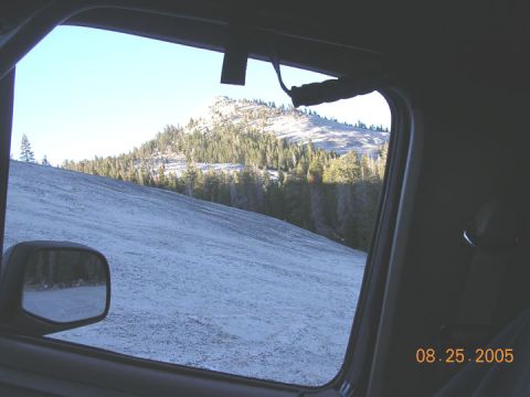 1994 Ford Bronco - View from inside a vehicle on a snowy day, looking out at a mountain covered in trees and snow. The date 08.25.2005 is visible.