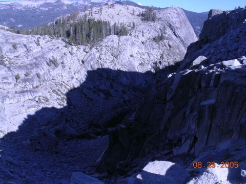 1994 Ford Bronco - A rocky mountain landscape is cast in shadow, with a date stamp of 08.25.2005 visible in the lower right corner.