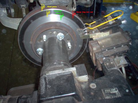1983 Ford Bronco - On-car brake lathe. The first cut was not deep enough to resurface this badly worn rotor, so it is being cut again.
