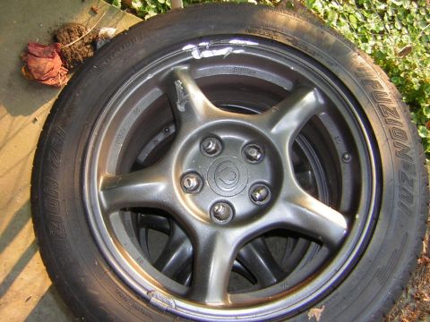 1993 Ford Probe - This is a close-up of a single car wheel and tire, not a 1993 Ford Probe.