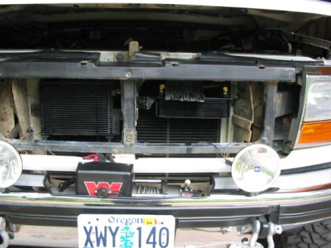 1995 Ford Bronco - Front view of a 1995 Ford Bronco with added transmission coolers and a winch.