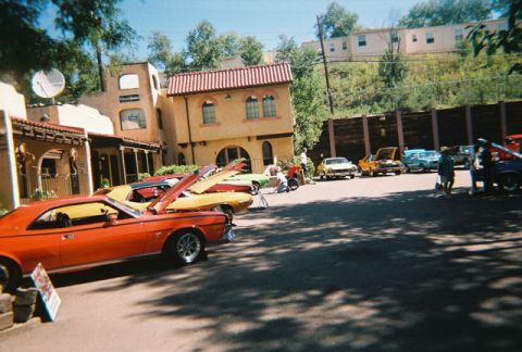 1972 Ford Ranchero - Classic cars gathered at an outdoor event, with a 1972 Ford Ranchero prominently displayed.