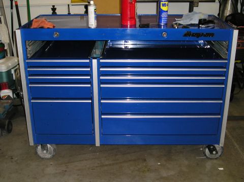 1993 Ford Bronco - Blue Snap-on tool chest with multiple drawers, some open, in a garage setting.