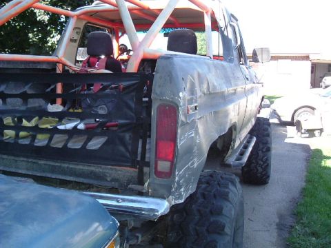 1979 Ford Bronco - This heavily modified 1979 Ford Bronco shows significant damage to its rear quarter panel and bed.