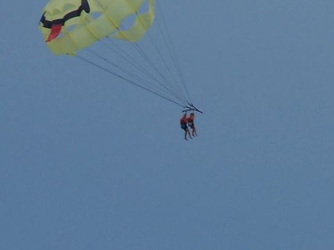 1979 Ford F-150 - Parasailing adventure with two individuals enjoying the sky view.