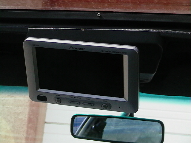 Pioneer screen mounted above rearview mirror
