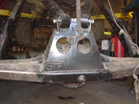 1991 Toyota Tacoma - A custom suspension component, possibly for an off-road vehicle, is shown with a 'GTF' logo stamped into it.