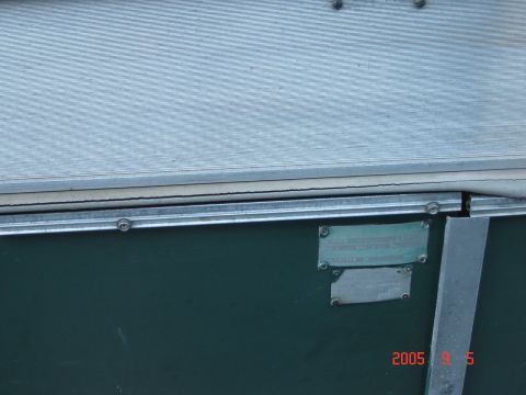 1993 Ford Bronco - Two data plates are visible on the side of the trailer, showing manufacturer and identification information.