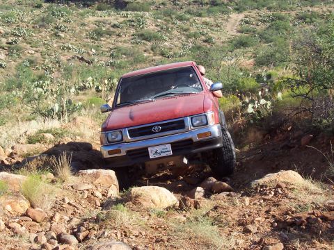 1981 Ford F-150 - Jared giving it hell. Remember the dent on your bumper? :)