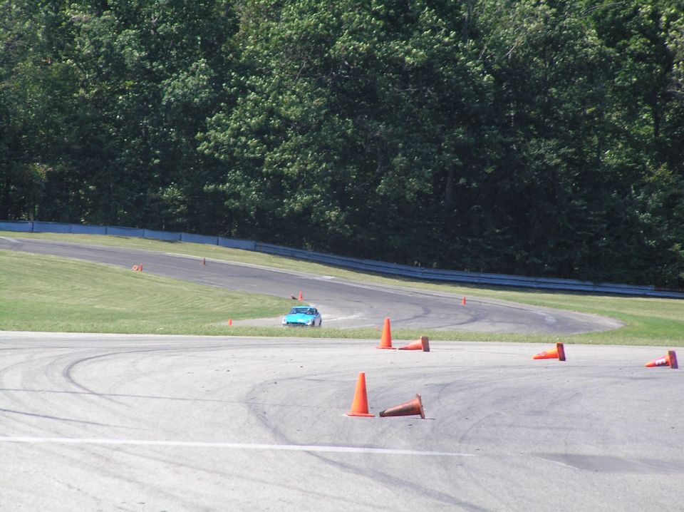 Datsun race car on hairpin