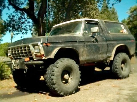 1978 Ford Bronco - This 1978 Ford Bronco features a distinctive grille and large off-road tires, suggesting it's ready for adventure.