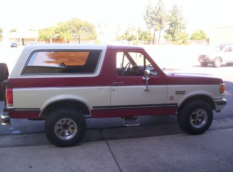 1989 Ford Bronco - This 1989 Ford Bronco is shown in a two-tone red and white paint scheme.