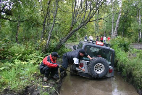 2003 Jeep TJ - Off-roading adventure goes wrong as a Jeep TJ gets stuck in the mud.