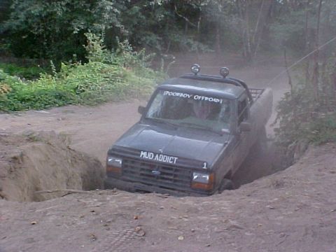 1992 Ford Ranger - This 1992 Ford Ranger is navigating a challenging off-road obstacle.