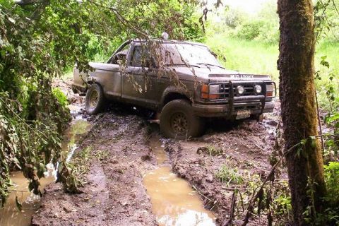1992 Ford Ranger - This 1992 Ford Ranger is deep in the mud on an off-road trail.