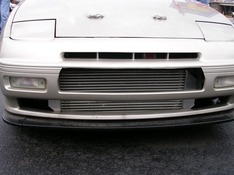 1989 Ford Probe front bumper with exposed intercooler and pop-up headlights