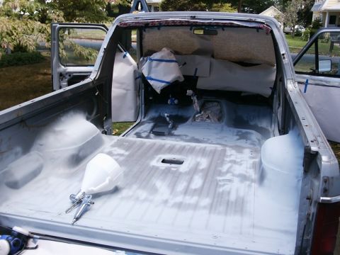 1982 Ford Bronco - Preparing the truck bed for a spray-in liner with painting equipment ready.