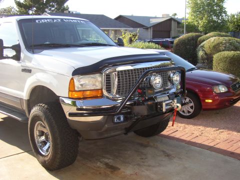 2001 Ford Excursion - New Milemarker 12k and light bar. Lots of steel upfront. :-)