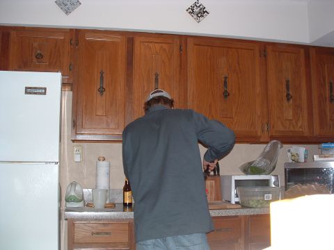 1993 Ford Bronco - Kitchen interior with a person standing at the counter, preparing food.