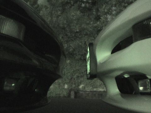1997 Ford Probe - Two car front ends are visible in this close-up shot.