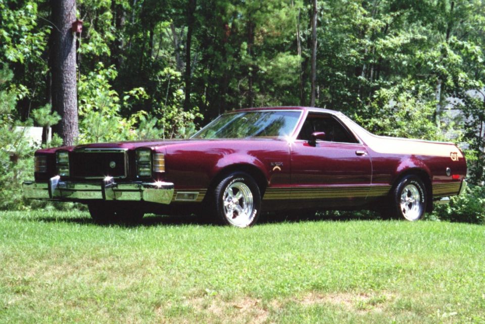 Maroon pickup truck with gold trim and GT badging, seen from a 3/4 front angle