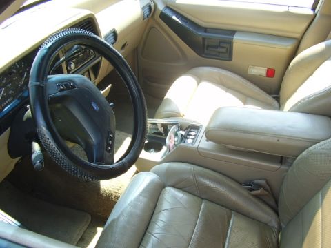1991 Ford Explorer - Interior view of a 1991 Ford Explorer, tan leather seats and dashboard.