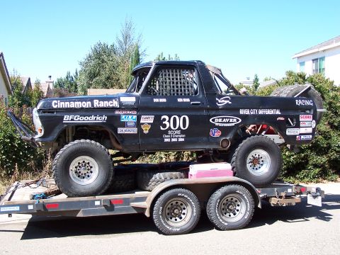 1979 Ford Bronco - This modified 1979 Ford Bronco is equipped for off-road racing with numerous sponsor decals and a roll cage.