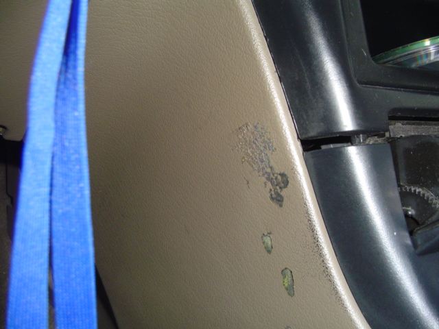 drivers side interior panel... adhesive from previous owner... couldnt get it off... im sure wih some specific adhesive remover it would come right off...