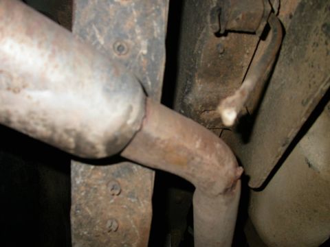 1990 Ford Bronco - Muffler hanger ripped off of exhaust pipe