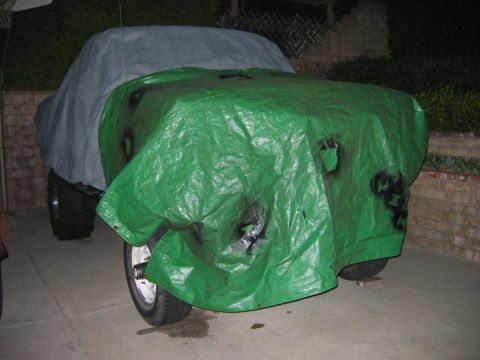 1985 Ford Bronco - i wonder whats under the tarp... :-D