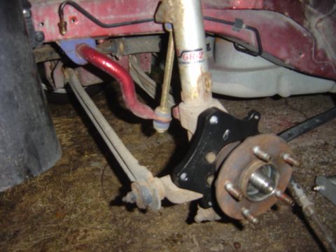 1998 Ford Taurus - Front suspension components including sway bar and shock absorber are visible in this close-up.