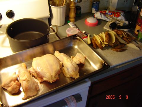 1993 Ford Bronco - A kitchen scene shows raw chicken and potatoes prepared for cooking, with a pot on the stove.