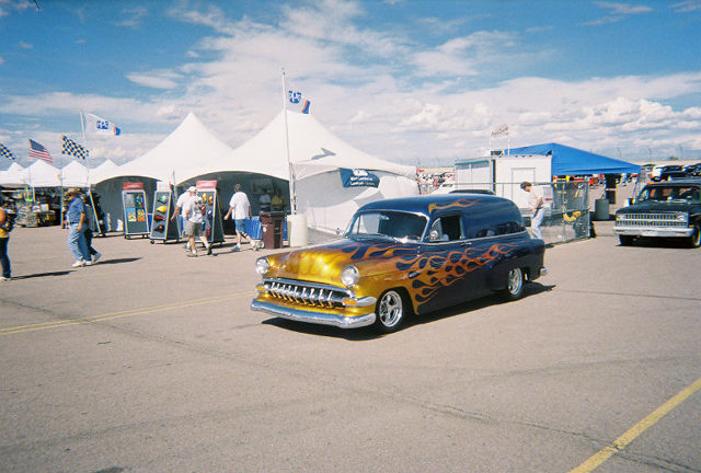 Gold and black panel van with flames, 1954 body style