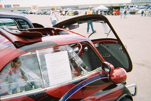 1972 Ford Ranchero - Interior view of a custom car with a sign displayed on the passenger window.