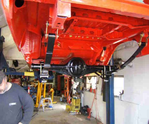 1967 Ford Ranchero - Underside view of a 1967 Ford Ranchero's rear axle and suspension components.