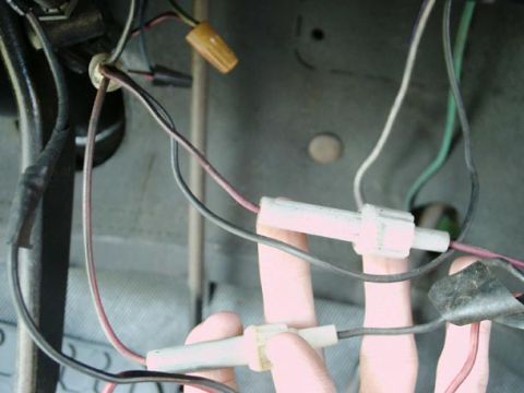 1971 Ford F-100 - Electrical wiring and fuse holders are visible in this close-up view.