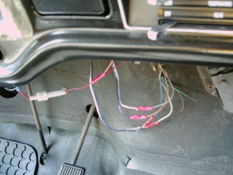 1971 Ford F-100 - Wiring harness under the dashboard of a 1971 Ford F-100, showing electrical connections.