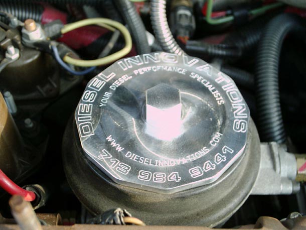 Diesel Innovations billet fuel filter cap removal socket seated on the filter cover
