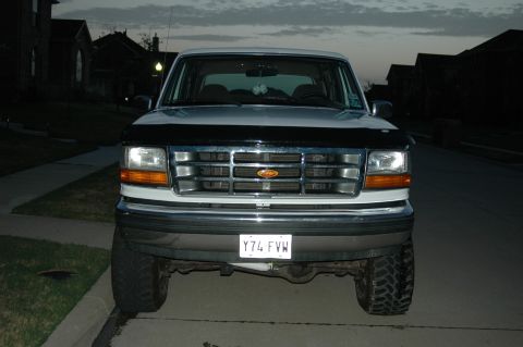 1992 Ford Bronco - This Ford F-150 pickup truck is shown from the front at dusk on a residential street.