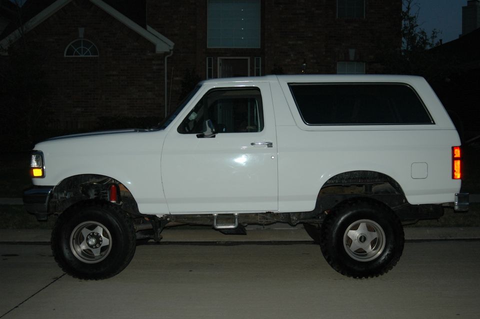 White 1992 Ford Bronco side view