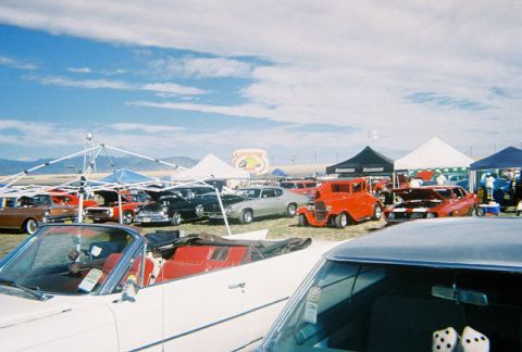 1972 Ford Ranchero - A variety of vintage cars are displayed under tents at an outdoor event.