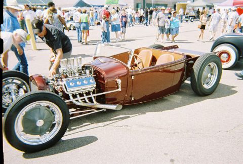 1972 Ford Ranchero - Custom hot rod roadster with a V8 engine and tan interior on display.