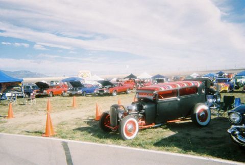 1972 Ford Ranchero - Cars are displayed under tents at an outdoor event on a sunny day.