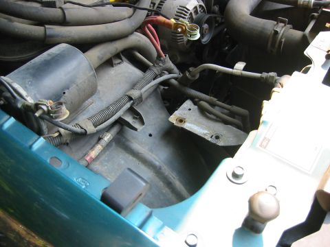 1996 Ford Bronco - take the battery out, and it helps to take out the tray woo. I left the horn, but that probably would have made things simplier too.