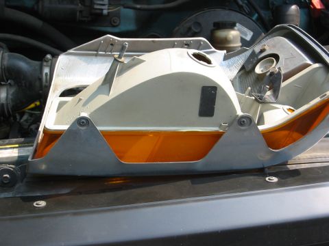 1996 Ford Bronco - three screws hold the turn signal. two here and then one on the side. also super easy.