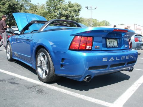 2001 Mercury Grand Marquis - Blue Saleen convertible sports car with custom rear bumper and Saleen badging.