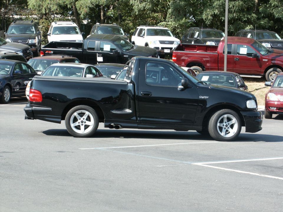 Black pickup truck side view